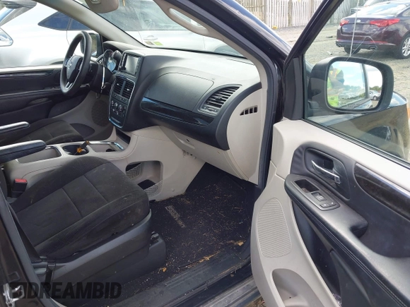 2013 Dodge Grand Caravan SXT with VIN 2C4RDGCG9DR563072, listed as a IAAI auction lot 42179166 with 211,008 mi miles and . Bid and sale history available at DreamBid. Image 5.