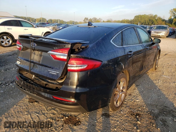 2020 Ford Fusion Hybrid Titanium with VIN 3FA6P0RU6LR100352, listed as a Copart auction lot 61331832 with 52,038 mi miles. Bid and sale history available at carsss.com. Image 4.