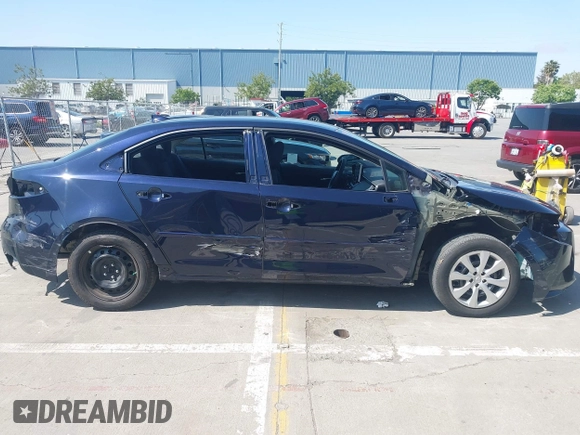 2020 Toyota Corolla LE with VIN 5YFEPRAE5LP145142, listed as a IAAI auction lot 42153289 with 35,010 mi miles and . Bid and sale history available at DreamBid. Image 14.