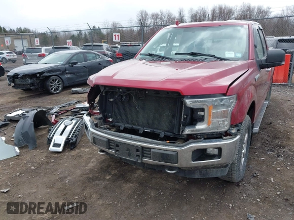 2018 Ford F-150 XL z VIN 1FTFX1E5XJFB66587, wystawiony jako IAAI lot #41870713 z przebiegiem 72 991 mil mil oraz . Historia ofert i sprzedaży dostępna na DreamBid. Obrazek 22.