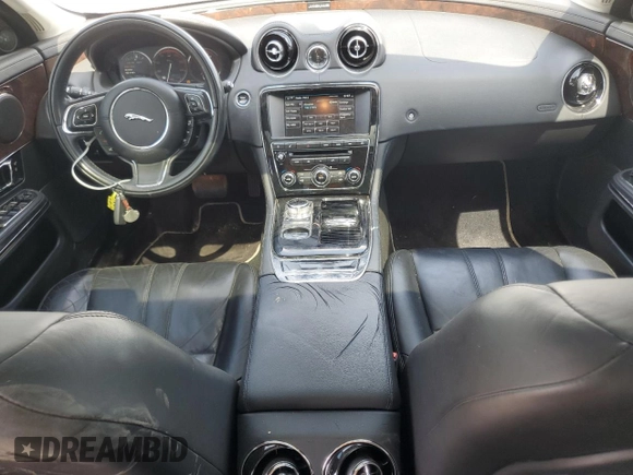 2015 Jaguar XJ with VIN SAJWJ1CD1F8V75232, listed as a Copart auction lot 57605685 with 146,314 mi miles and Salvage title. Bid and sale history available at DreamBid. Image 8.