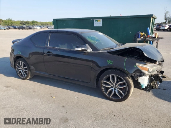 2015 Scion tC with VIN JTKJF5C79FJ003581, listed as a Copart auction lot 52973655 with 106,641 mi miles and Salvage Title. Bid and sale history available at carsss.com. Image 4.