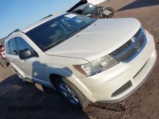 2014 Dodge Journey SE with VIN 3C4PDCAB4ET119412, listed as a IAAI auction lot 41760074 with 148,882 mi miles. Bid and sale history available at carsss.com. Image 1.