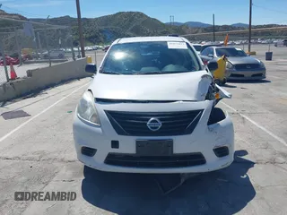 2014 Nissan Versa SV with VIN 3N1CN7AP0EL861162, listed as a IAAI auction lot 41871833 with 118,934 mi miles. Bid and sale history available at carsss.com. Image 12.