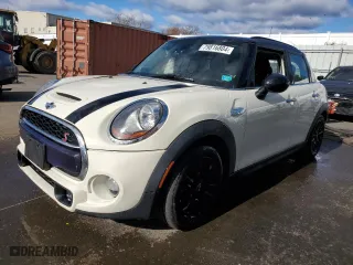 2016 MINI Cooper Hardtop 4 Door S with VIN WMWXU3C51G2D28585, listed as a Copart auction lot 79816804 with 69,215 mi miles and Salvage Title. Bid and sale history available at carsss.com. Image 1.