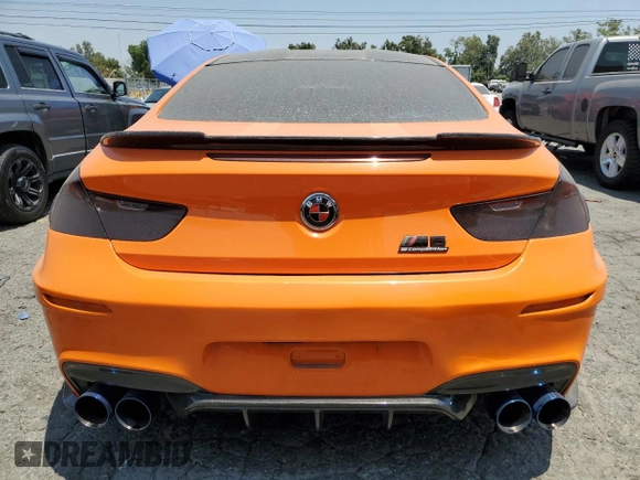 2015 BMW M6 z VIN WBSLX9C56FD160804, wystawiony jako Copart lot #57771054 z przebiegiem 57 699 mil mil oraz Szkody całkowita. Historia ofert i sprzedaży dostępna na DreamBid. Obrazek 6.