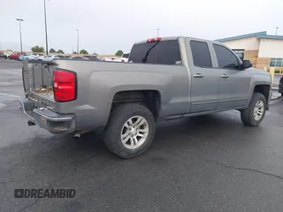 2017 Chevrolet Silverado 1500 LT with VIN 1GCRCRECXHZ159962, listed as a IAAI auction lot 41634689 with 145,978 mi miles and . Bid and sale history available at DreamBid. Image 4.