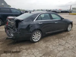 2014 Cadillac CTS Luxury AWD with VIN 1G6AX5S35E0190361, listed as a Copart auction lot 54497655 with 32,664 mi miles and Salvage title. Bid and sale history available at DreamBid. Image 3.