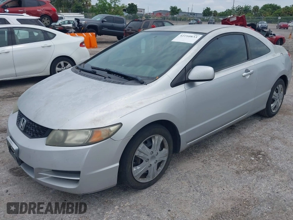 2009 Honda Civic Cpe LX with VIN 2HGFG12609H533389, listed as a IAAI auction lot 42210833 with 233,360 mi miles. Bid and sale history available at carsss.com. Image 2.