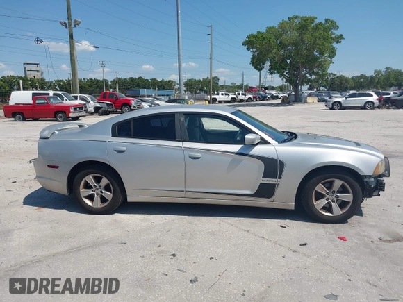 2012 Dodge Charger SE with VIN 2C3CDXBG5CH119493, listed as a IAAI auction lot 42126739 with 138,464 mi miles and . Bid and sale history available at carsss.com. Image 14.