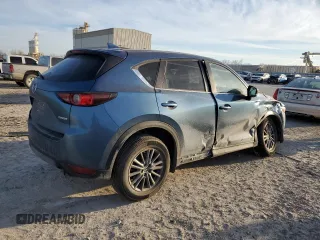 2020 Mazda CX-5 Touring with VIN JM3KFBCM9L0737243, listed as a Copart auction lot 46908495 with 76,956 mi miles and Salvage Title. Bid and sale history available at carsss.com. Image 3.