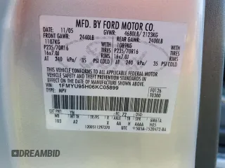 2006 Ford Escape with VIN 1FMYU95H06KC05899, listed as a Copart auction lot 69793844 with 119,923 mi miles and Salvage title. Bid and sale history available at DreamBid. Image 13.