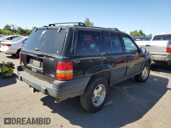 1998 Jeep Grand Cherokee Laredo with VIN 1J4GZ58Y4WC109610, listed as a Copart auction lot 58705124 with 247,990 mi miles and Salvage Title. Bid and sale history available at carsss.com. Image 3.