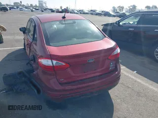 2015 Ford Fiesta SE with VIN 3FADP4BJ9FM113760, listed as a IAAI auction lot 41647960 with 122,868 mi miles. Bid and sale history available at carsss.com. Image 3.