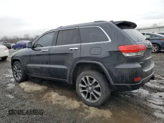 2017 Jeep Grand Cherokee Overland with VIN 1C4RJFCGXHC927470, listed as a Copart auction lot 45132185 with 119,543 mi miles and Salvage Title. Bid and sale history available at carsss.com. Image 2.