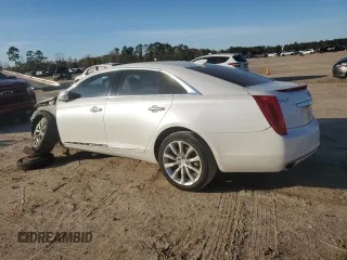 2016 Cadillac XTS Luxury Collection with VIN 2G61M5S38G9108012, listed as a Copart auction lot 88417485 with 134,811 mi miles and Salvage title. Bid and sale history available at DreamBid. Image 2.