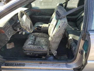1996 Cadillac Eldorado z VIN 1G6EL12Y6TU613813, wystawiony jako Copart lot #78274114 z przebiegiem Nie podano mil oraz Szkoda całkowita • Salvage title. Historia ofert i sprzedaży dostępna na DreamBid. Obrazek 7.