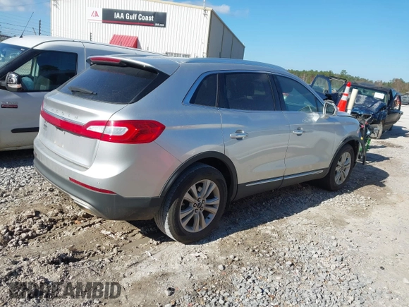 2017 Lincoln MKX Premiere with VIN 2LMPJ6JR3HBL14683, listed as a IAAI auction lot 41143809 with 90,590 mi miles. Bid and sale history available at carsss.com. Image 4.