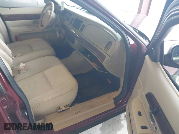 2006 Mercury Grand Marquis LS Premium z VIN 2MEHM75VX6X628404, wystawiony jako IAAI lot #42227639 z przebiegiem 170 132 mil mil oraz . Historia ofert i sprzedaży dostępna na DreamBid. Obrazek 5.