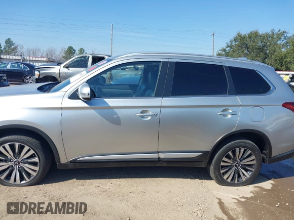 2020 Mitsubishi Outlander ES z VIN JA4AZ3A38LZ024741, wystawiony jako IAAI lot #41599013 z przebiegiem 184 469 mil mil oraz . Historia ofert i sprzedaży dostępna na DreamBid. Obrazek 14.