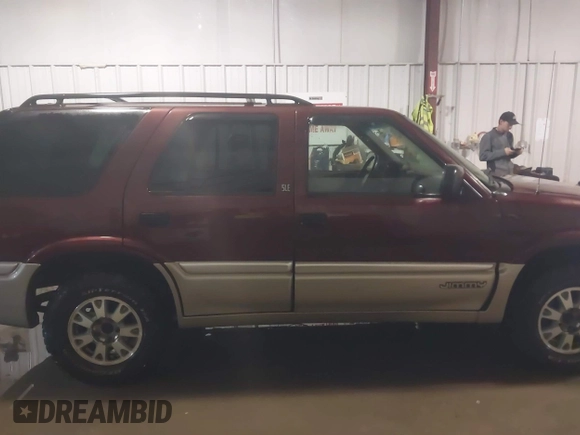 2001 GMC Jimmy SLE with VIN 1GKDT13W712195040, listed as a IAAI auction lot 41710729 with 189,584 mi miles. Bid and sale history available at carsss.com. Image 13.