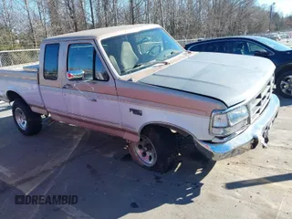 1996 Ford F-150 with VIN 1FTEX14N4TKA28292, listed as a IAAI auction lot 41422154 with 173,728 mi miles. Bid and sale history available at carsss.com. Image 1.