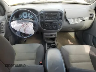 2003 Ford Escape XLS Popular with VIN 1FMYU92193KA49798, listed as a Copart auction lot 59922804 with 187,032 mi miles and Non Repairable. Bid and sale history available at carsss.com. Image 8.