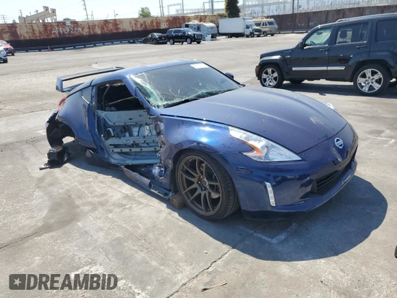 2016 Nissan 370Z z VIN JN1AZ4EH9GM933658, wystawiony jako Copart lot #48760215 z przebiegiem 70 682 mil mil oraz Szkoda całkowita • Salvage title. Historia ofert i sprzedaży dostępna na DreamBid. Obrazek 4.