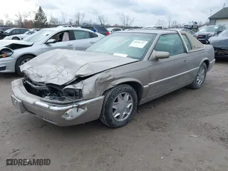 2000 Cadillac Eldorado with VIN 1G6EL12Y9YU184545, listed as a IAAI auction lot 40993392 with 51,983 mi miles. Bid and sale history available at carsss.com. Image 17.
