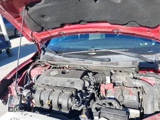 2014 Nissan Sentra SR z VIN 3N1AB7APXEL613811, wystawiony jako IAAI lot #42187989 z przebiegiem 205 633 mil mil oraz . Historia ofert i sprzedaży dostępna na DreamBid. Obrazek 10.