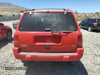 1997 Jeep Grand Cherokee Limited with VIN 1J4GZ78Y7VC573971, listed as a Copart auction lot 61358024 with 171,055 mi miles and Salvage Title. Bid and sale history available at carsss.com. Image 6.