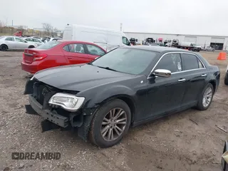 2016 Chrysler 300 with VIN 2C3CCAEG0GH348651, listed as a IAAI auction lot 41967981 with 141,728 mi miles. Bid and sale history available at carsss.com. Image 2.