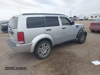 2010 Dodge Nitro SE with VIN 1D4PT2GK8AW144406, listed as a IAAI auction lot 41590691 with 165,959 mi miles and . Bid and sale history available at DreamBid. Image 4.
