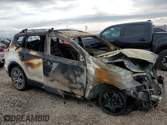 2018 Toyota RAV4 LE with VIN JTMBFREV1JJ718166, listed as a Copart auction lot 43698905 with Not Provided miles and Non Repairable. Bid and sale history available at DreamBid. Image 4.