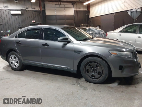 2015 Ford Police Interceptor z VIN 1FAHP2MK4FG119536, wystawiony jako IAAI lot #41635340 z przebiegiem 165 322 mil mil oraz . Historia ofert i sprzedaży dostępna na DreamBid. Obrazek 14.