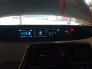 2017 Toyota Prius Two z VIN JTDKARFU7H3041322, wystawiony jako IAAI lot #42358306 z przebiegiem 98 735 mil mil oraz . Historia ofert i sprzedaży dostępna na DreamBid. Obrazek 7.
