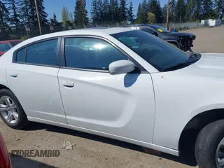 2022 Dodge Charger SXT with VIN 2C3CDXBG4NH197301, listed as a IAAI auction lot 42053688 with 60,592 mi miles and . Bid and sale history available at DreamBid. Image 13.