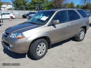 2003 Acura MDX Touring Pkg with VIN 2HNYD18623H549599, listed as a IAAI auction lot 41879934 with 242,896 mi miles. Bid and sale history available at carsss.com. Image 2.