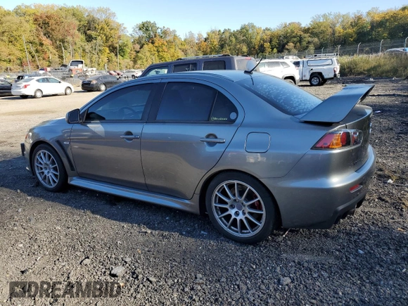 2014 Mitsubishi Lancer Evolution GSR z VIN JA32W8FV6EU018171, wystawiony jako Copart lot #77109934 z przebiegiem 83 467 mil mil oraz Tytuł czysty. Historia ofert i sprzedaży dostępna na DreamBid. Obrazek 2.