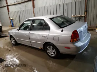 2004 Hyundai Accent GL with VIN KMHCG45C04U544804, listed as a Copart auction lot 72912984 with 121,178 mi miles and Salvage Title. Bid and sale history available at carsss.com. Image 2.