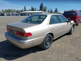 2001 Toyota Camry CE with VIN JT2BG22K910581703, listed as a IAAI auction lot 42020085 with 107,035 mi miles. Bid and sale history available at carsss.com. Image 4.