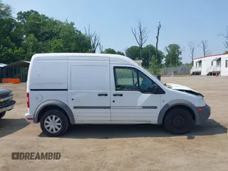 2010 Ford Transit Connect XL z VIN NM0LS7CN7AT000582, wystawiony jako IAAI lot #42425627 z przebiegiem 193 333 mil mil oraz . Historia ofert i sprzedaży dostępna na DreamBid. Obrazek 13.