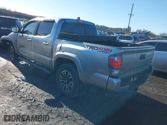 2023 Toyota Tacoma 4WD SR with VIN 3TMCZ5ANXPM543065, listed as a IAAI auction lot 41101092 with 33,792 mi miles. Bid and sale history available at carsss.com. Image 3.
