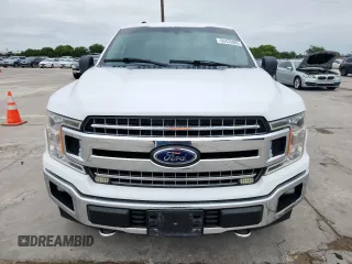 2018 Ford F-150 XL with VIN 1FTEW1E54JKC36073, listed as a Copart auction lot 63433085 with 136,844 mi miles and Clean title. Bid and sale history available at DreamBid. Image 5.