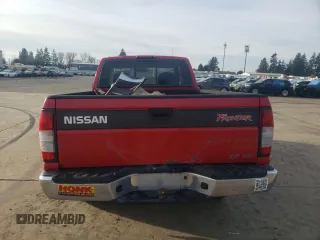 1999 Nissan Frontier XE with VIN 1N6ED26Y2XC312863, listed as a Copart auction lot 42259015 with 212,666 mi miles and Salvage title. Bid and sale history available at DreamBid. Image 6.