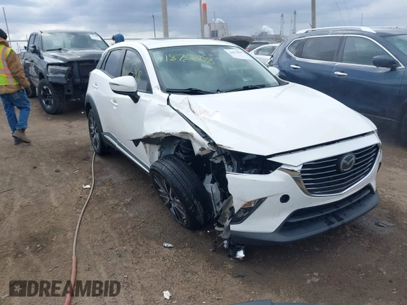 2016 Mazda CX-3 Grand Touring with VIN JM1DKFD73G0129737, listed as a IAAI auction lot 41875808 with 120,547 mi miles. Bid and sale history available at carsss.com. Image 1.