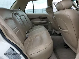 1999 Mercury Grand Marquis LS с VIN 2MEFM75W6XX619412, выставлен на аукционе Copart как лот 51939515 с пробегом 131 784 миль миль и Списание • Salvage title. История ставок и продаж доступна на DreamBid. Изображение 11.