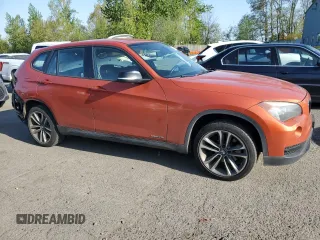 2014 BMW X1 xDrive28i z VIN WBAVL1C50EVY11864, wystawiony jako Copart lot #54181865 z przebiegiem 84 636 mil mil oraz Szkoda całkowita • Salvage title. Historia ofert i sprzedaży dostępna na DreamBid. Obrazek 4.