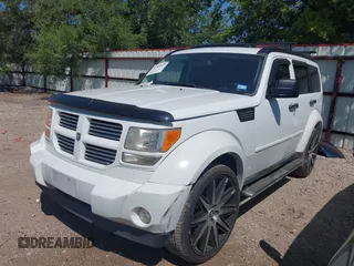 2011 Dodge Nitro Heat with VIN 1D4PT4GX9BW587284, listed as a IAAI auction lot 41998357 with 100,366 mi miles and . Bid and sale history available at DreamBid. Image 17.