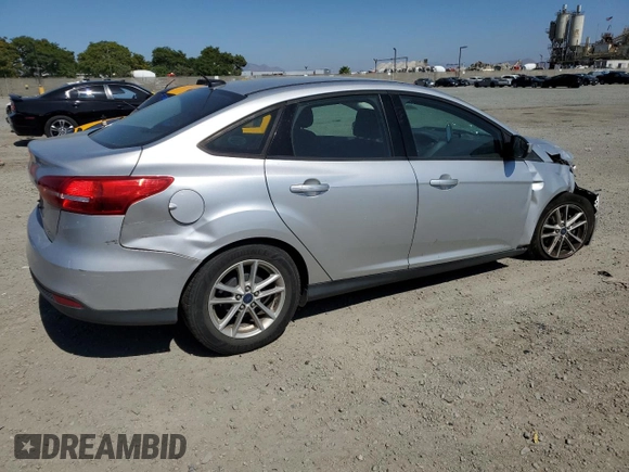 2018 Ford Focus SE with VIN 1FADP3F25JL324753, listed as a Copart auction lot 58624995 with 129,127 mi miles and Salvage title. Bid and sale history available at DreamBid. Image 3.